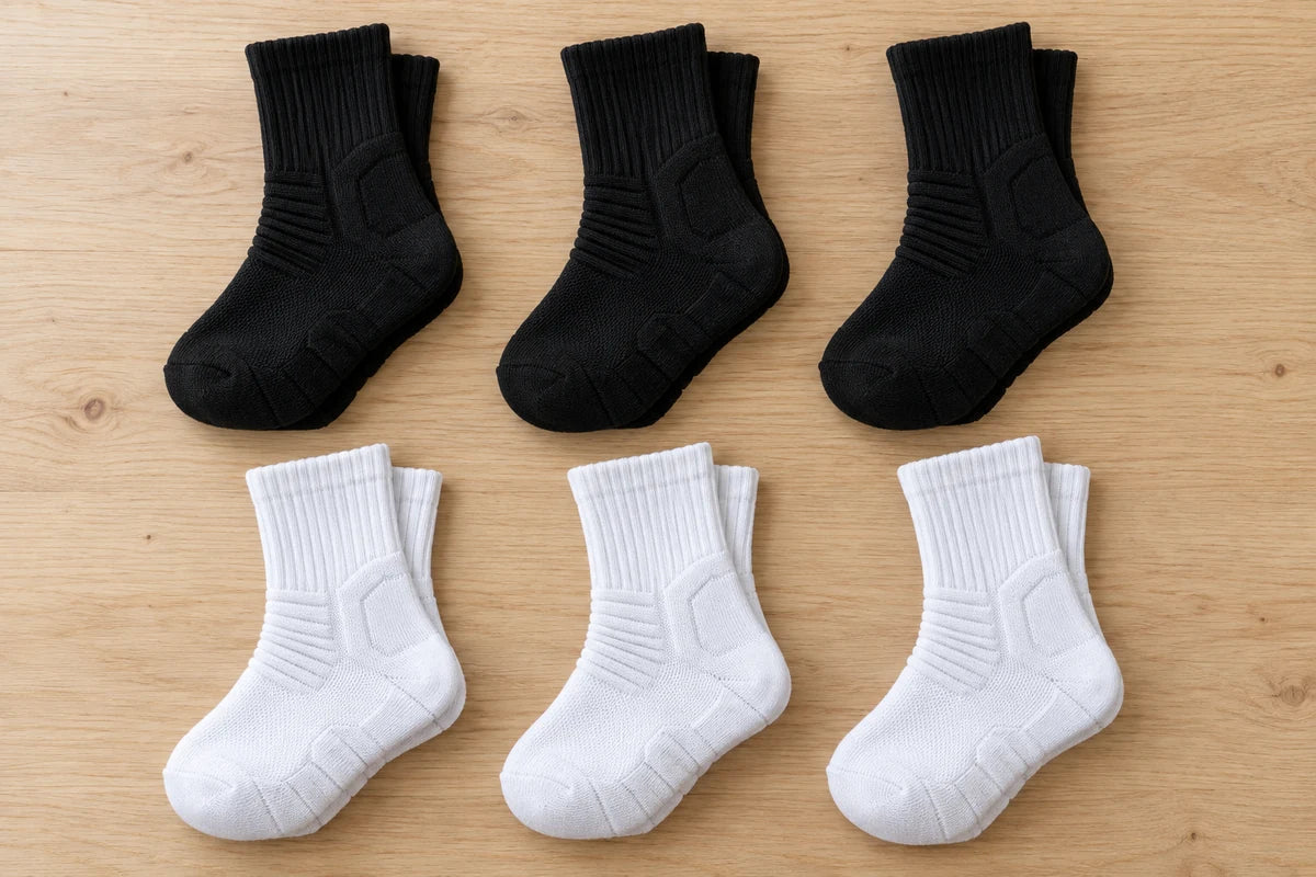 Illustrated mixed bundle of six pairs: three black pairs and three white pairs